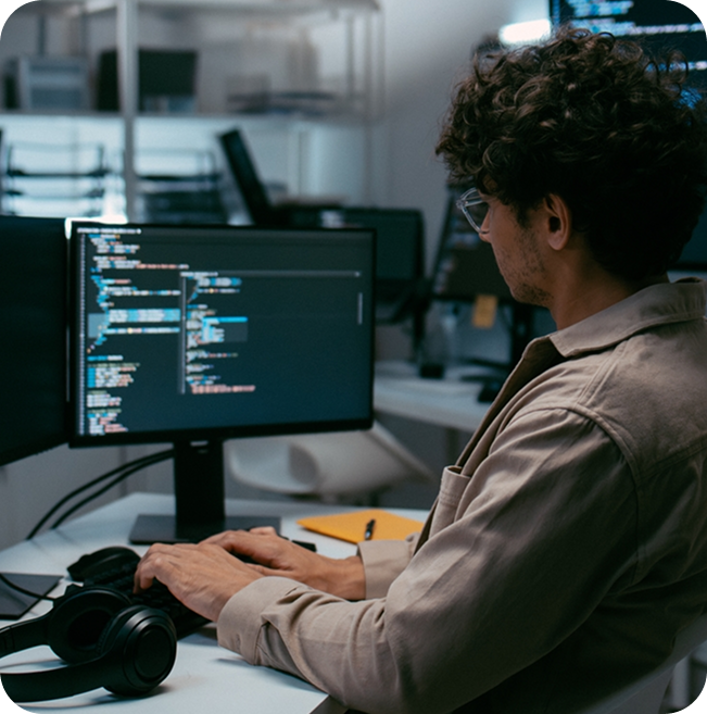 WordPress developer reviewing code on a monitor